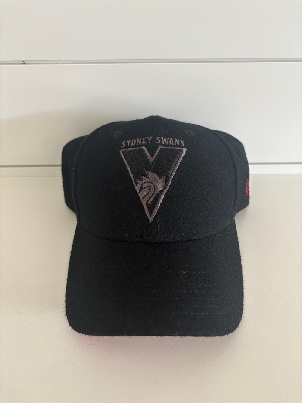New Era Sydney Swans Black Cap with Gray Logo